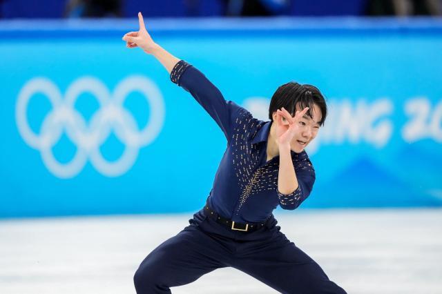 1644325008221011260.jpg figure-skating-beijing-olympics-738-superJumbo.jpg